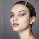 Con trucos como las pestañas largas, se puede disimular los párpados caídos. Foto: Gettyimages.