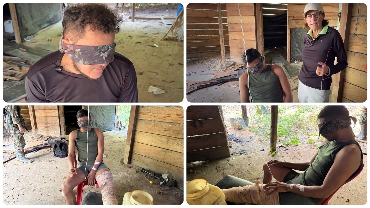 Salud Hernández-Mora con los dos guerrilleros del ELN en las profundidades del Catatumbo.