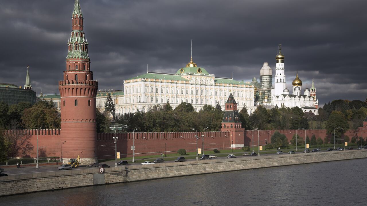 Walls of the Kremlin with the Grand Kremlin Palace and Cathedral behind, Moscow, Russia. David Clapp / Getty Images.