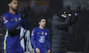 Chelsea's head coach Thomas Tuchel, right, applauds fans at the end of the FA Cup fifth round soccer match between Luton Town and Chelsea at Kenilworth Road in Luton, England, Wednesday, March 2, 2022. (AP Photo/Ian Walton)