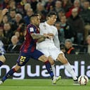 Dani Alves y Cristiano Ronaldo durante un clásico en 2015
