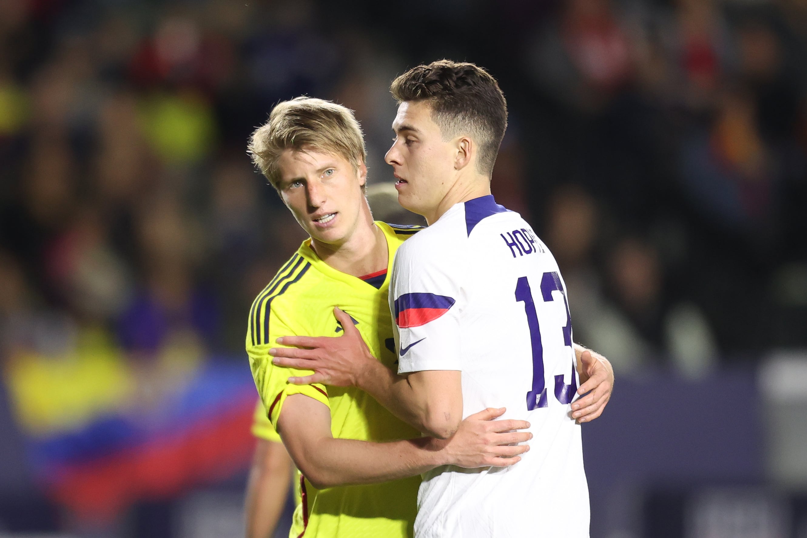 CARSON, CA - JANUARY 28: Andrés Llinás #3 of Colombia and Matthew Hoppe #13 of United States fight for position during the international friendly match between United States and Colombia at Dignity Health Sports Park on January 28, 2023 in Carson, California. (Photo by Omar Vega/Getty Images)
