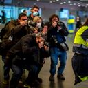 FILE - In this Thursday, Feb. 25, 2021 file photo a police officer receives an AstraZeneca vaccine during a mass COVID-19 vaccination campaign at Wanda Metropolitano stadium in Madrid, Spain. The Madrid regional government has started vaccinating its emergency services personnel. At least a dozen countries including Germany, France, Italy and Spain have now temporarily suspended their use of AstraZeneca's coronavirus vaccine after reports last week that some people in Denmark and Norway who got a dose developed blood clots, even though there's no evidence that the shot was responsible. The European Medicines Agency and the World Health Organization say the data available don't suggest the vaccine caused the clots and that people should continue to be immunized. Here's a look at what we know — and what we don't. (AP Photo/Manu Fernandez, File)