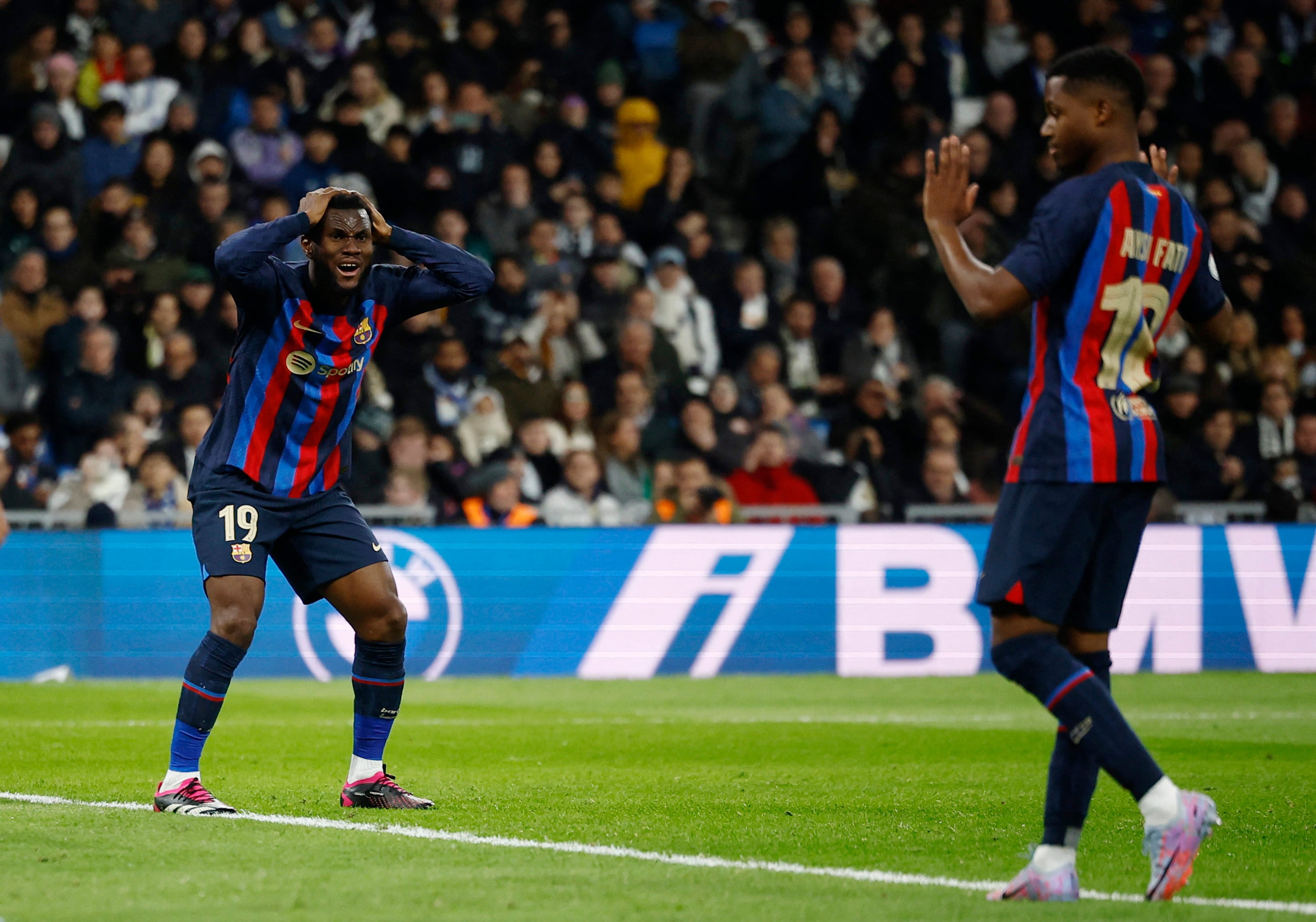 Soccer Football - Copa del Rey - Semi Final - First Leg - Real Madrid v FC Barcelona - Santiago Bernabeu, Madrid, Spain - March 2, 2023 FC Barcelona's Franck Kessie and Ansu Fati react after a missed chance REUTERS/Juan Medina