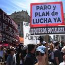 Members of labor unions protest against President Javier Milei�s emergency decree during a demonstration called by Argentina's Labor Union (CGT) outside of the Justice Palace in Buenos Aires on December 27, 2023. Argentina's libertarian President Javier Milei last week unleashed a mega-decree to change or scrap 366 economic rules in a country accustomed to heavy government intervention in the market. (Photo by Luis ROBAYO / AFP)