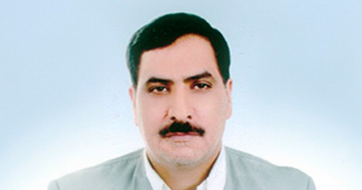 Fotografía de Ali‑Reza Asgari en civil, sentado, aparentemente en una reunión o conferencia.