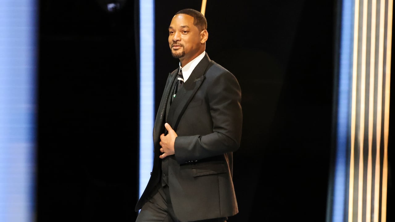 HOLLYWOOD, CA - March 27, 2022: Will Smith holds his Oscar for best actor for King Richard during the show at the 94th Academy Awards at the Dolby Theatre at Ovation Hollywood on Sunday, March 27, 2022. (Robert Gauthier / Los Angeles Times via Getty Images)