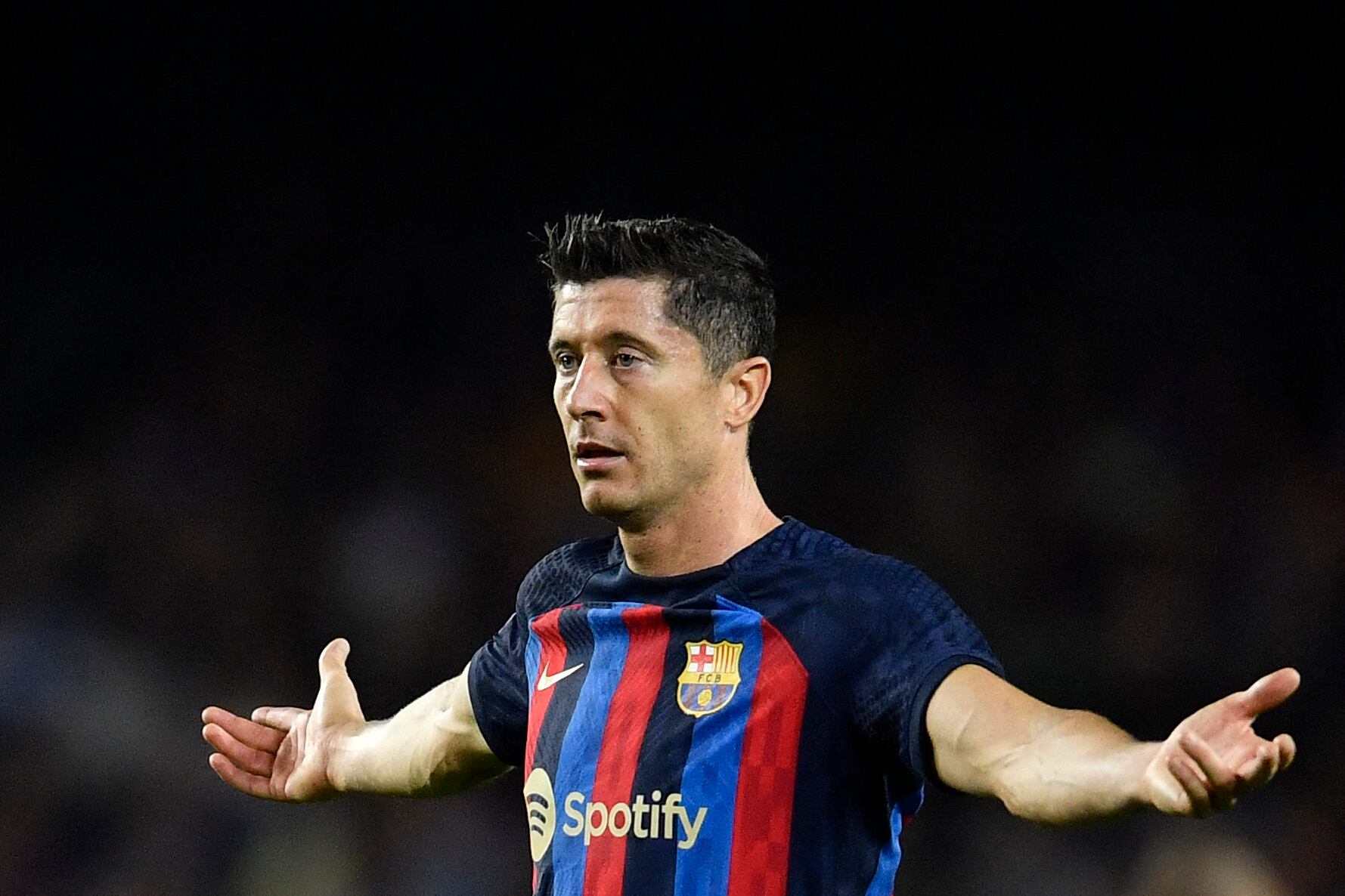 Barcelona's Polish forward Robert Lewandowski reacts during the UEFA Champions League 1st round, group C, football match between FC Barcelona and Inter Milan at the Camp Nou stadium in Barcelona on October 12, 2022. (Photo by Pau BARRENA / AFP)