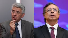 De izquierda a derecha: Enrique Gómez y Gustavo Petro.