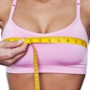 Woman taking measurements