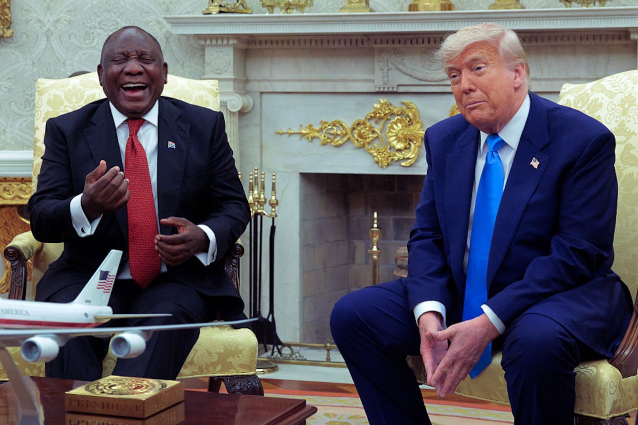 WASHINGTON, DC - MAY 21: U.S. President Donald Trump and South Africa President Cyril Ramaphosa debate during a press availability in the Oval Office at the White House on May 21, 2025 in Washington, DC. Relations between the two countries have been strained since Trump signed an executive order in February that claimed white South Africans are the victims of government land confiscation and race-based “genocide,” while admitting some of those Afrikaners as refugees to the United States. Trump also halted all foreign aid to South Africa and expelled the country’s Ambassador to the U.S., Ebrahim Rasool. (Photo by Chip Somodevilla/Getty Images)