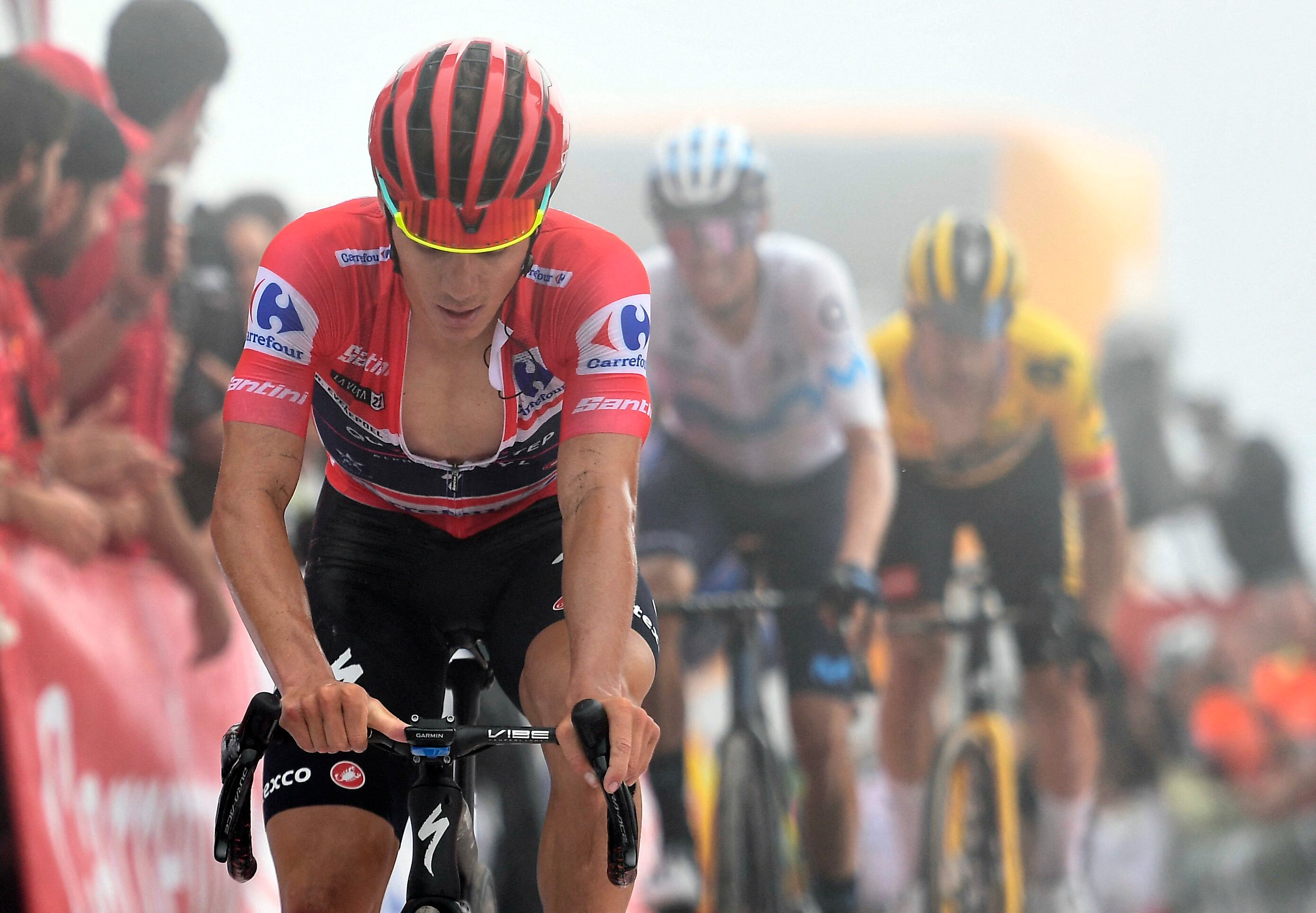 Team Quick Step's Belgian rider Remco Evenepoel crosses the finish line in fifth place during the 8th stage of the 2022 La Vuelta cycling tour of Spain, a 153.4 km race from Pola de Laviana to Collau Fancuaya - Yernes y Tameza, on August 27, 2022. (Photo by ANDER GILLENEA / AFP)