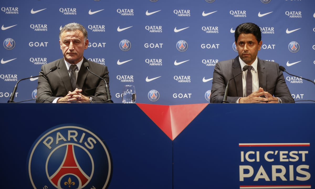 PSG president Nasser al-Khelaifi, right, and Christophe Galtier attend a press conference at the Parc des Princes stadium, Tuesday, July 5, 2022 in Paris. Christophe Galtier became Paris Saint-Germain's seventh coach in 11 years under the club's ambitious Qatari-backed ownership, with Mauricio Pochettino becoming the fourth straight coach to be fired during that time. (AP/Thomas Padilla)