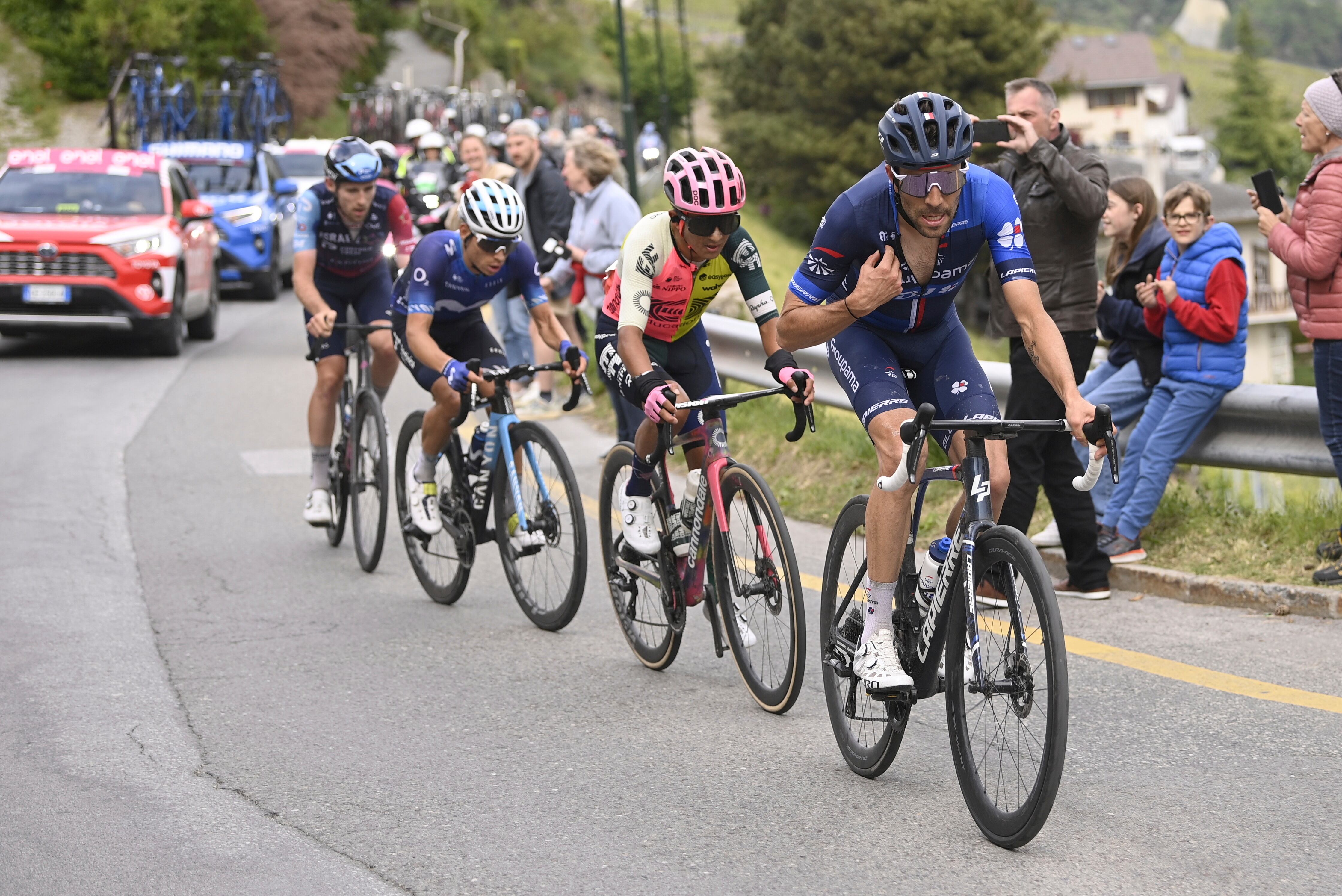 France's Thibaut Pinot, right, leads Ecuador's Jonathan Kléver Caicedo Cepeda during the 13rd stage of the Giro D'Italia, tour of Italy cycling race, from Borgofranco D'Ivrea to Crans Montana, Friday, May 19, 2023. (Fabio Ferrari/LaPresse via AP)