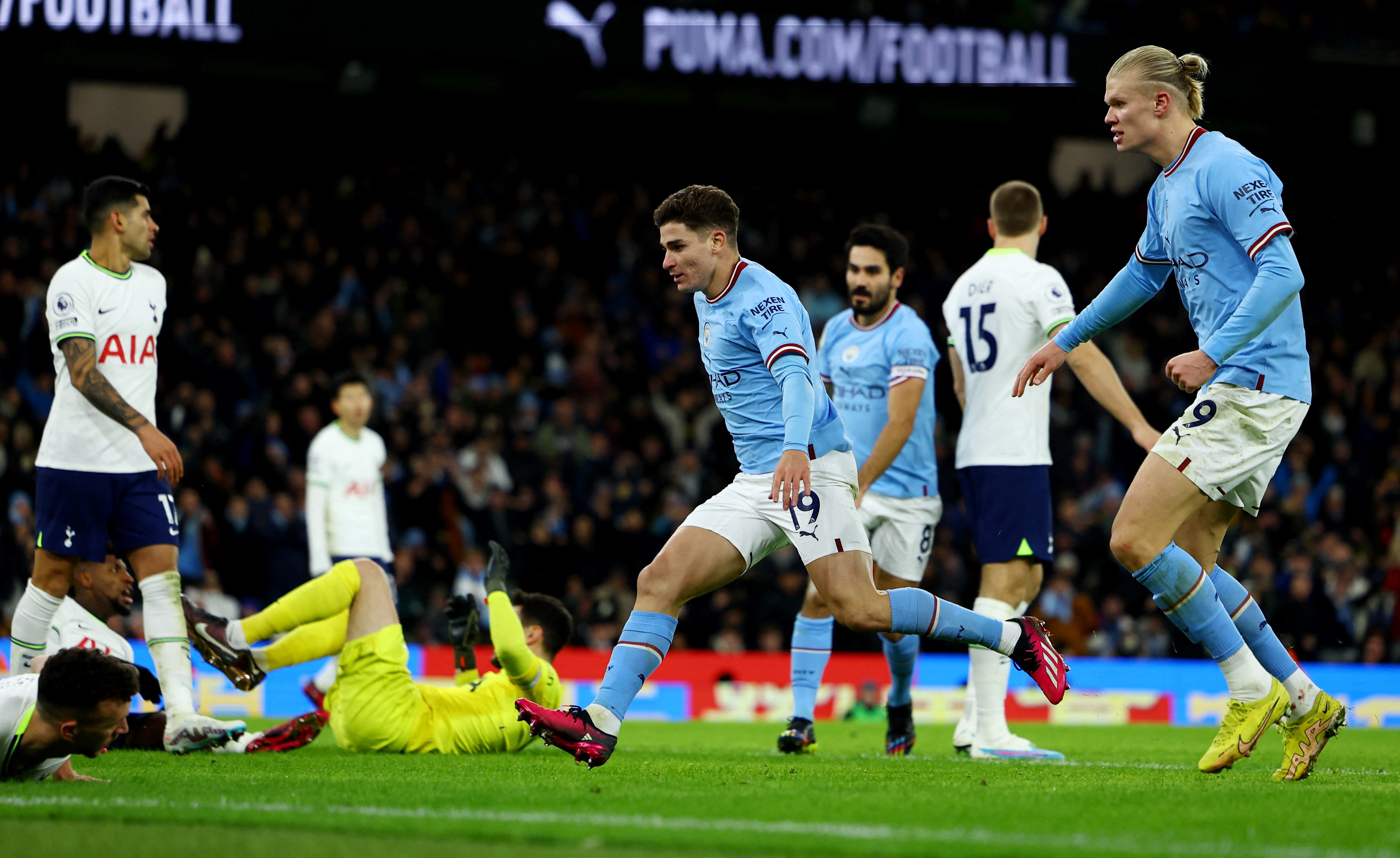 Soccer Football - Premier League - Manchester City v Tottenham Hotspur - Etihad Stadium, Manchester, Britain - January 19, 2023 Manchester City's Julian Alvarez scores their first goal REUTERS/Molly Darlington EDITORIAL USE ONLY. No use with unauthorized audio, video, data, fixture lists, club/league logos or 'live' services. Online in-match use limited to 75 images, no video emulation. No use in betting, games or single club /league/player publications.  Please contact your account representative for further details.