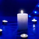 Pentagram and burning candles. The magical ritual of Satanism, invocation of spirits, spiritualistic sessions.