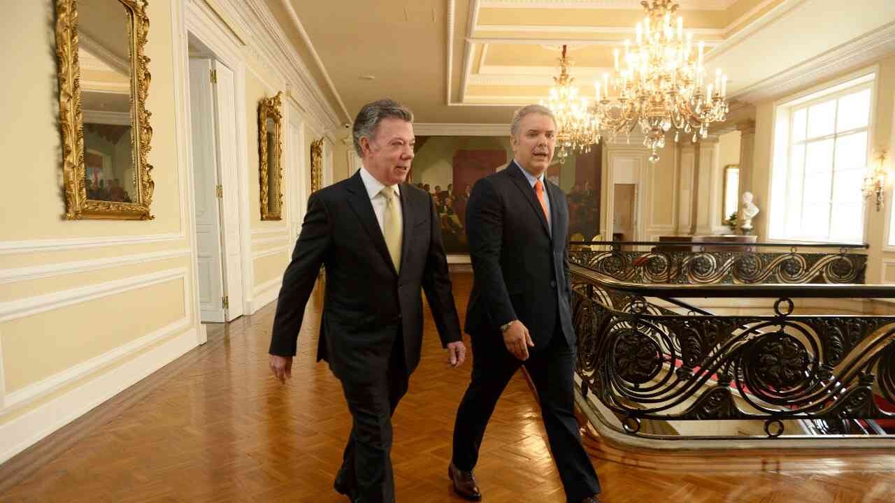 Los expresidentes Juan Manuel Santos e Iván Duque, en Bogotá, el primero de septiembre de 2020