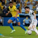 Argentina's Lionel Messi, right, is challenged by Brazil's Thiago Silva, left, and Casemiro during the Copa America final soccer match at the Maracana stadium in Rio de Janeiro, Brazil, Saturday, July 10, 2021. (AP Photo/Bruna Prado)