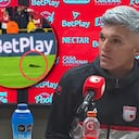 Una crítica de Daniel Torres (der.), jugador de Santa Fe, al estado de la grama de El Campín.