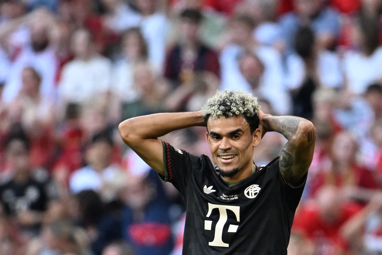 Bayern Munich's Colombian forward #14 Luis Diaz reacts during a friendly football match between FC Bayern Munich and Tottenham Hotspur in Munich, southern Germany, on August 7, 2025. (Photo by LUKAS BARTH-TUTTAS / AFP)