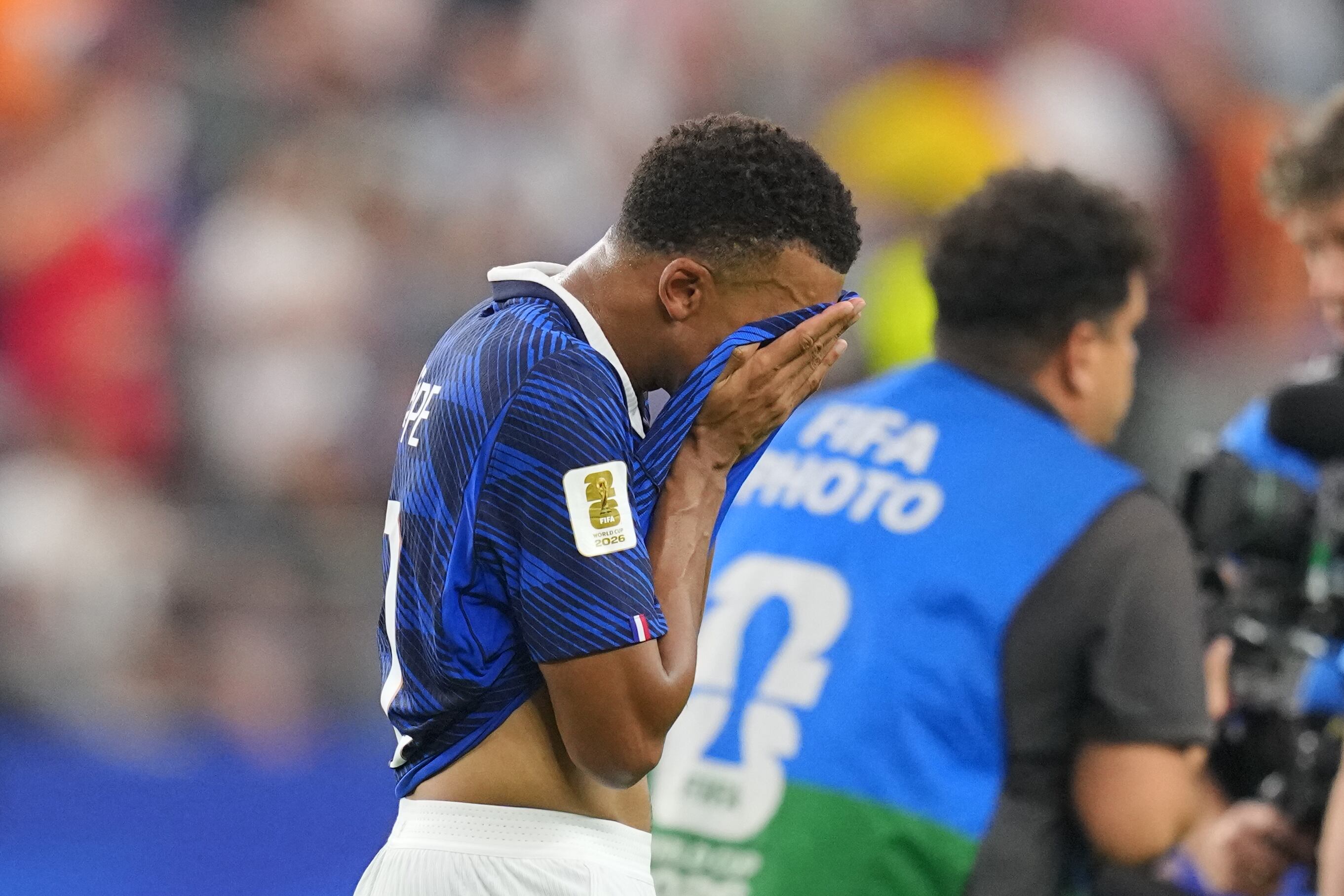 France's Kylian Mbappe walks of the field after his side's lost in a World Cup semifinal soccer match against Spain in Arlington, Texas, near Dallas, Tuesday, July 14, 2026. (AP Photo/Julio Cortez)