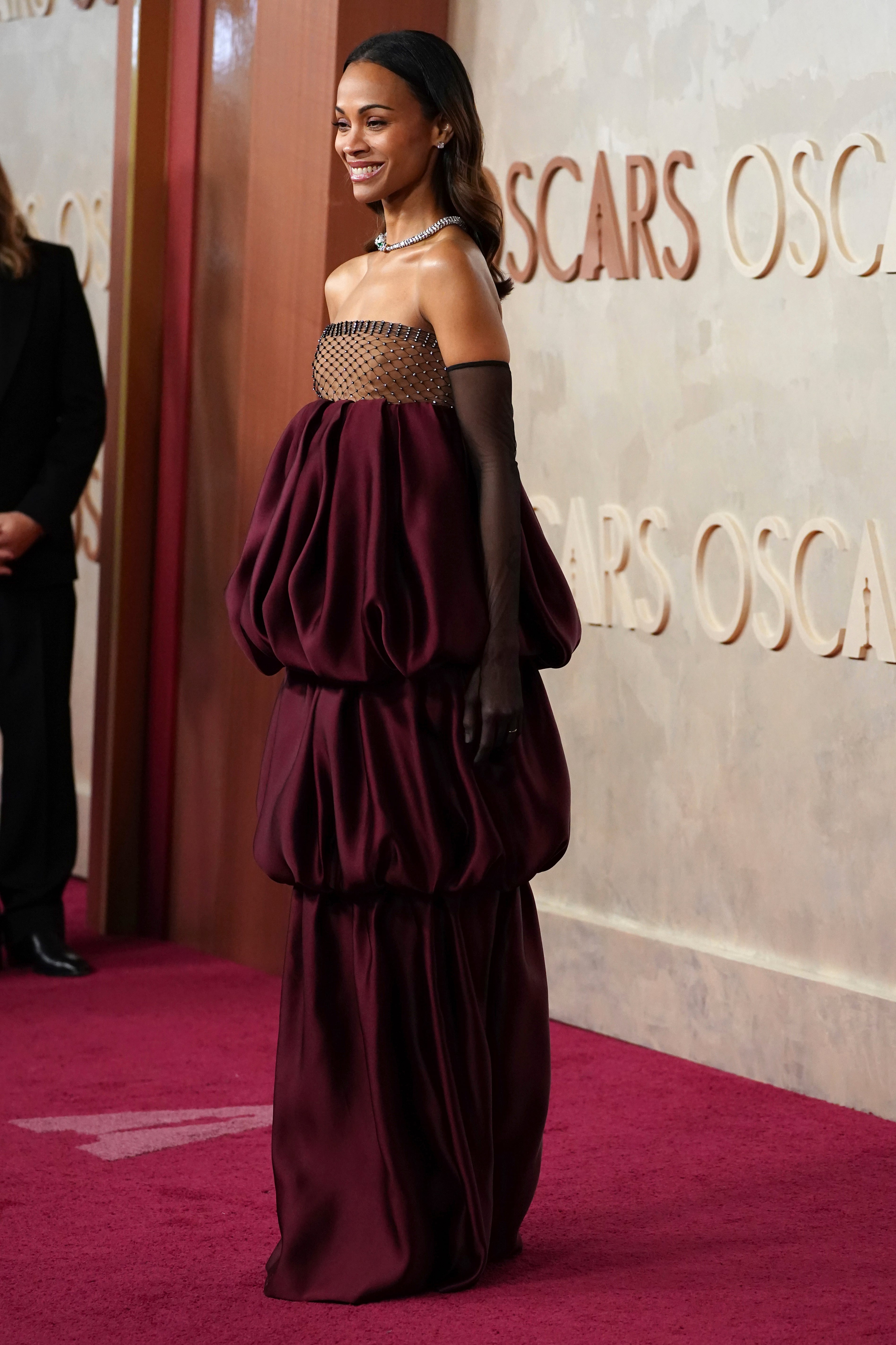 Zoe Saldana arrives at the Oscars on Sunday, March 2, 2025, at the Dolby Theatre in Los Angeles. (Photo by Jordan Strauss/Invision/AP)