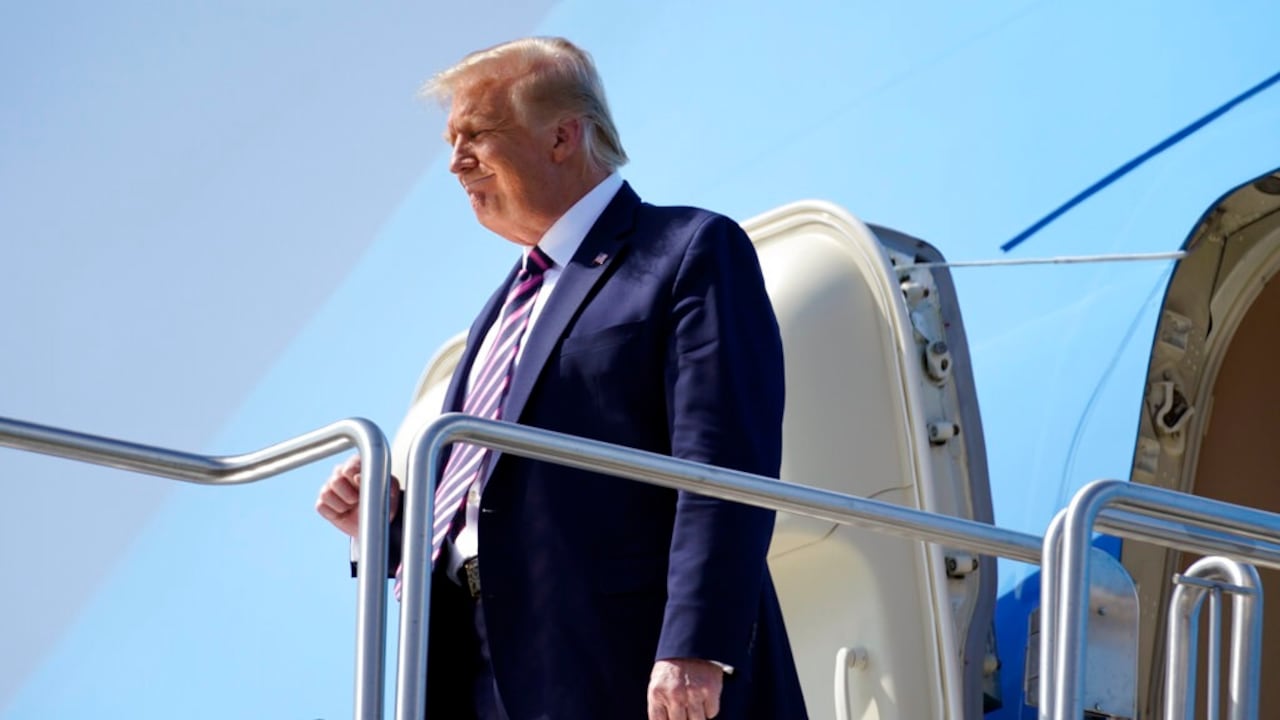President Donald Trump arrives at Phoenix Sky Harbor International Airport in Phoenix, Monday, Sept. 14, 2020, to attend a Latinos for Trump Coalition Roundtable. (AP Photo/Andrew Harnik