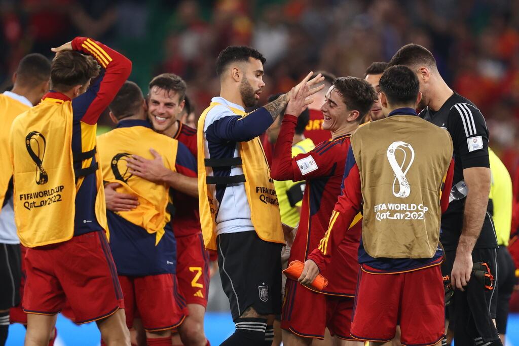 DOHA, QATAR - NOVEMBER 23: David Raya with Gavi of Spain at full time the FIFA World Cup Qatar 2022 Group E match between Spain and Costa Rica at Al Thumama Stadium on November 23, 2022 in Doha, Qatar. (Photo by James Williamson - AMA/Getty Images)