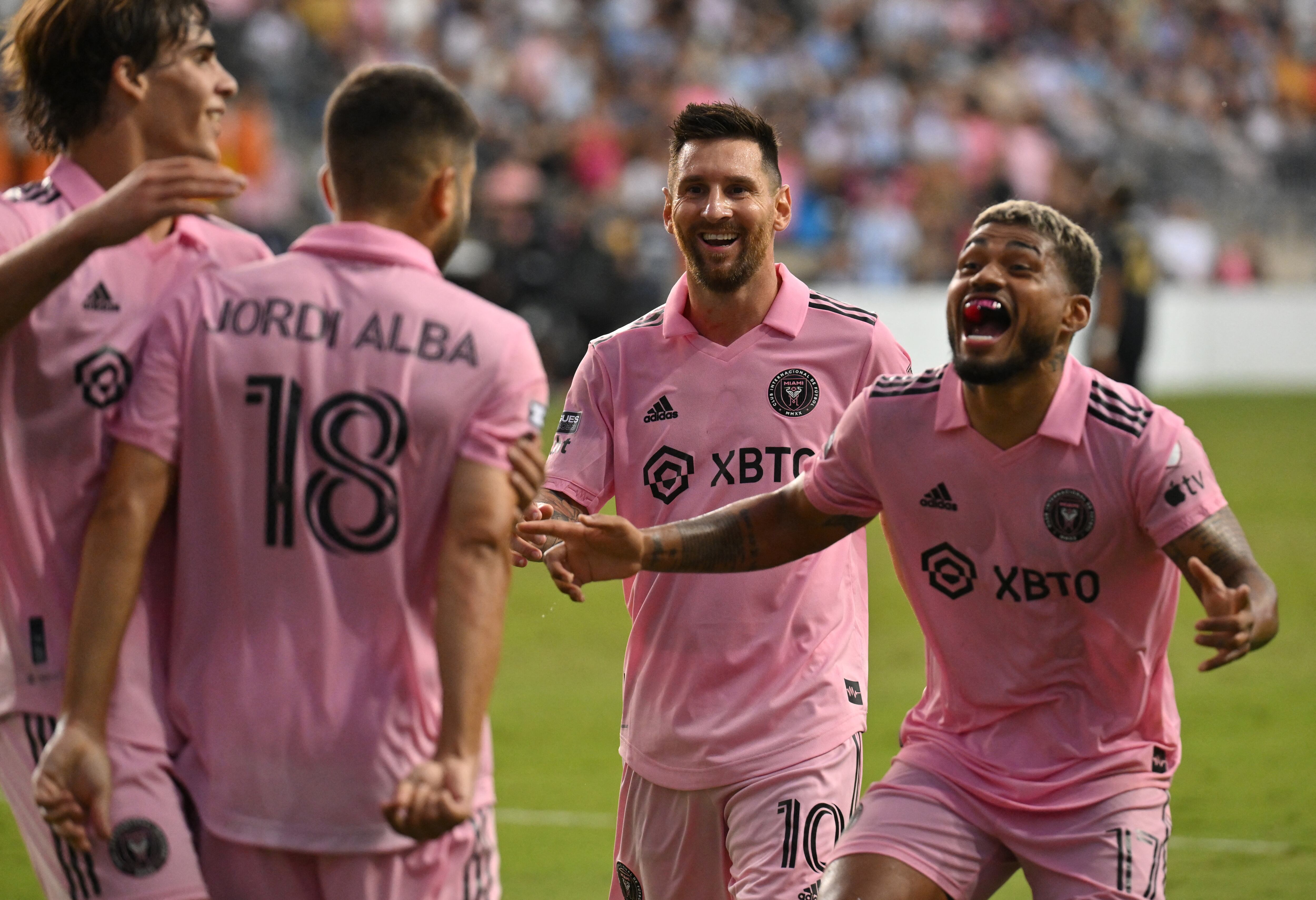 Inter Miami's Argentine forward #10 Lionel Messi with Venezuelan forward #17 Josef Martinez celebrate Spanish defender #18 Jordi Alba's goal during the CONCACAF Leagues Cup semifinal football match between Inter Miami and Philadelphia at Subaru Park Stadium in Chester, Pennsylvania, on August 15, 2023. (Photo by ANGELA WEISS / AFP)