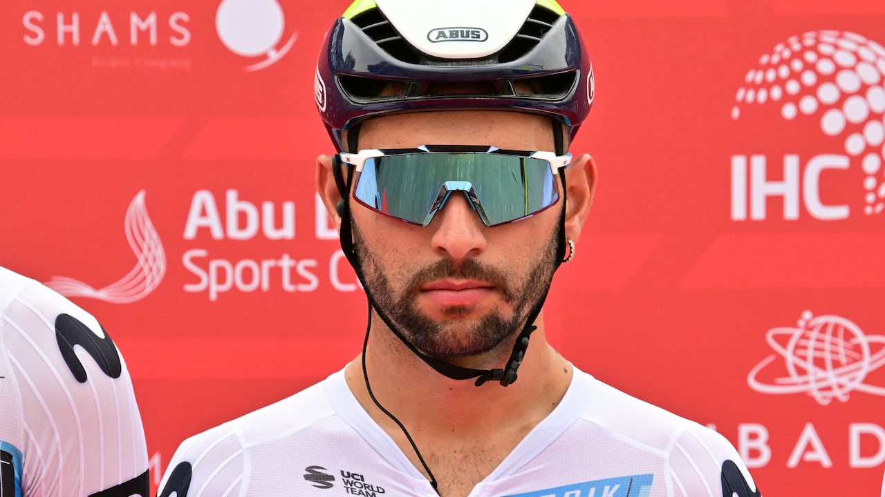 Movistar team's Colombian rider Fernando Gaviria looks on during the first stage of the UAE Tour cycling race from Shams Solar Power Station Madinat Zayed to Liwa Palace in Abu Dhabi on February 17, 2025. (Photo by Giuseppe CACACE / AFP)