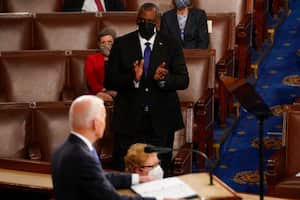 Defense Secretary Lloyd Austin applauds as President Joe Biden speaks to a joint session of Congress Wednesday, April 28, 2021, in the House Chamber at the U.S. Capitol in Washington. (AP Photo/Andrew Harnik, Pool)