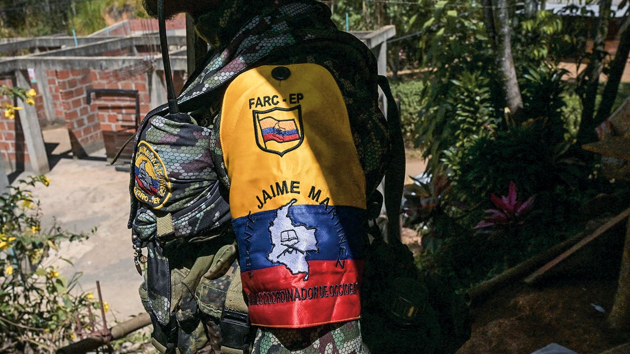 Un guerrillero de la disidencia de las FARC, «Jaime Martínez». (Photo by JOAQUIN SARMIENTO / AFP)