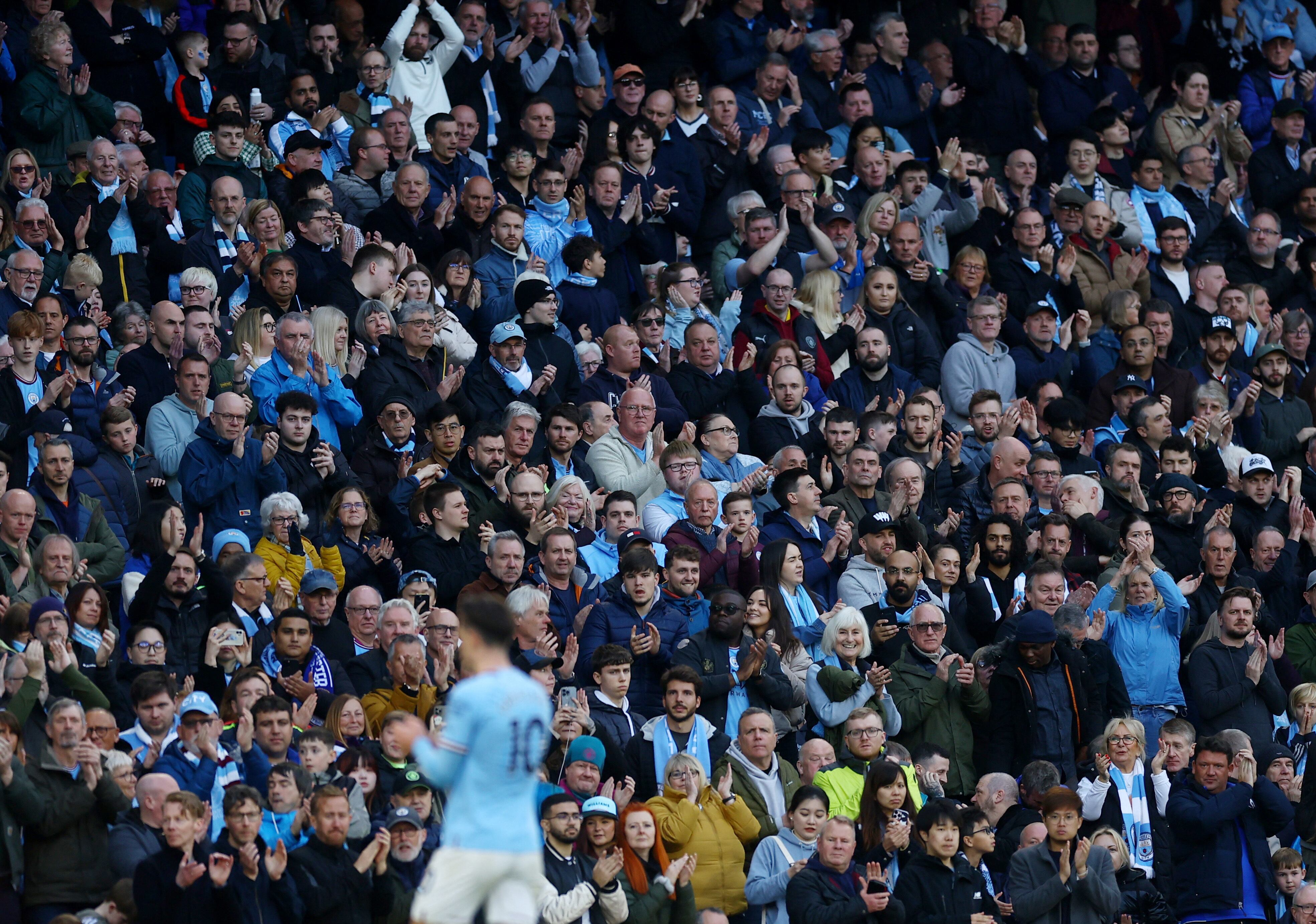 Soccer Football - Premier League - Manchester City v Leicester City - Etihad Stadium, Manchester, Britain - April 15, 2023  Manchester City fans applaud Jack Grealish as he walks to substituted Action Images via Reuters/Lee Smith EDITORIAL USE ONLY. No use with unauthorized audio, video, data, fixture lists,