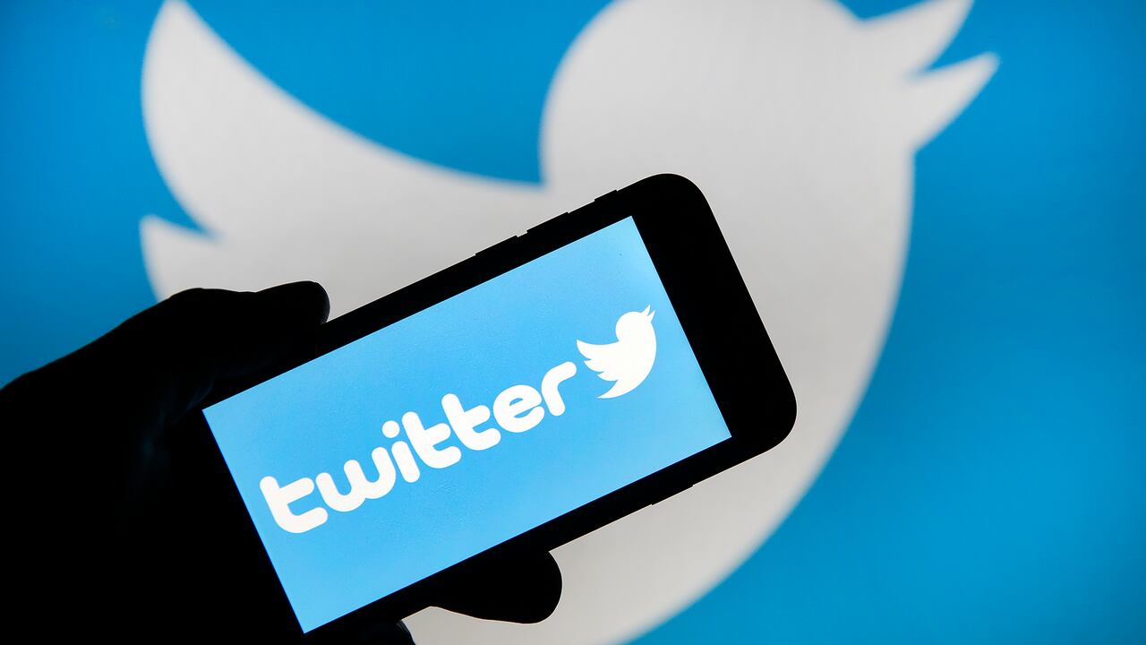 PARIS, FRANCE - FEBRUARY 07: In this photo illustration the Twitter logo is displayed on the screen of an iPhone in front of a computer screen displaying a Twitter logo on February 07, 2019 in Paris, France. Twitter today posted better than expected Wall Street results over the last three months of 2018, with net profit up 28% and revenue up 4%, but the stock is falling. After losing 5 million monthly users by the end of 2018, the social network Twitter decided to stop giving figures. In its financial results for the fourth quarter of 2018, the company explains that this announcement will take effect in the second quarter of 2019. (Photo by Chesnot/Getty Images)