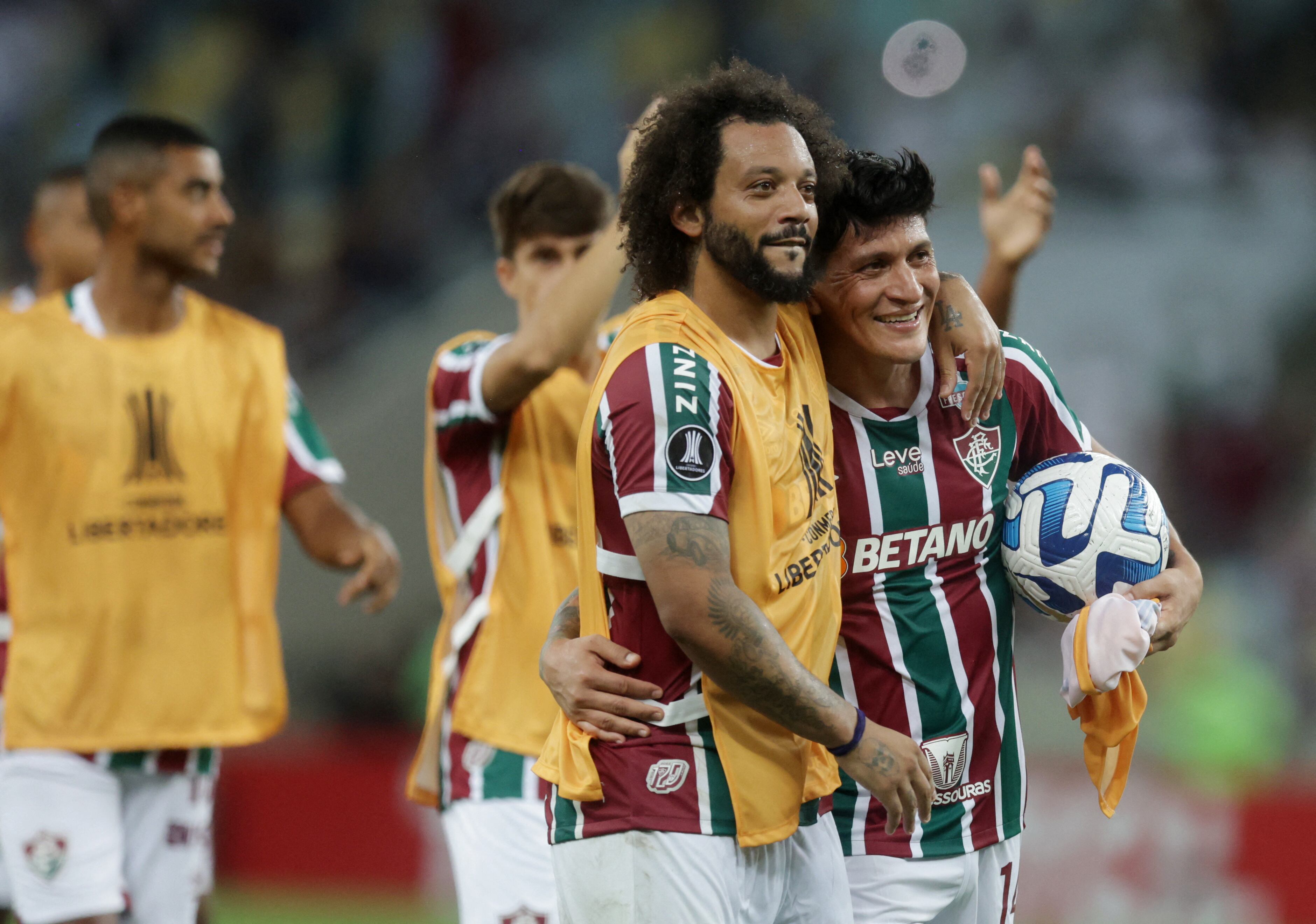 Soccer Football - Copa Libertadores -  Group D - Fluminense v River Plate - Estadio Maracana, Rio de Janeiro, Brazil - May 2, 2023 Fluminense's German Cano celebrates after the game with Marcelo and the match ball after scoring a hat-trick REUTERS/Ricardo Moraes