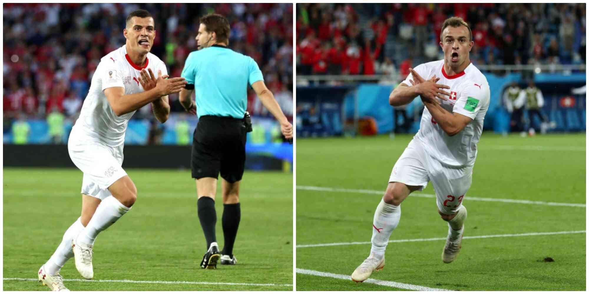 Granit Xhaka y Skrodan Shaqiri anotando contra Serbia.