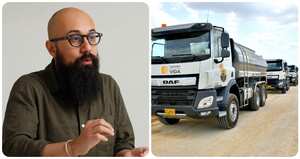 Carlos Carrillo y los carrotanques que compró la entidad antes de que él llegara al cargo.