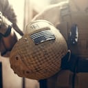 American flag on helmet of US Marine soldier.