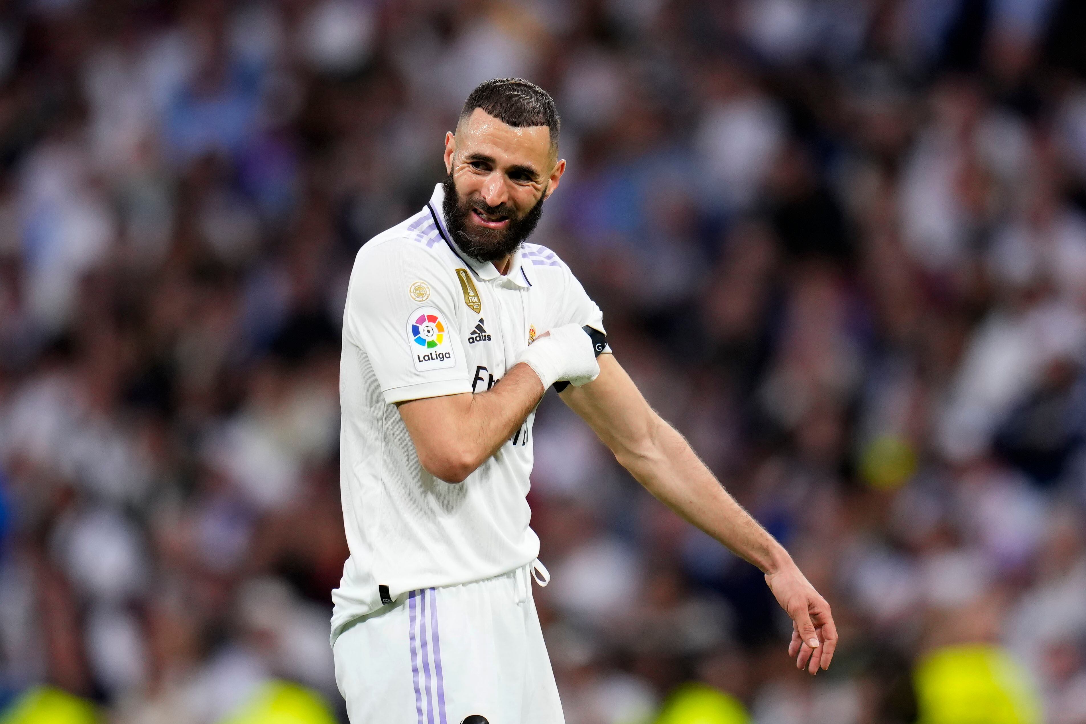Real Madrid's Karim Benzema reacts during a Spanish La Liga soccer match between Real Madrid and Rayo Vallecano at the Santiago Bernabeu stadium in Madrid, Spain, Wednesday, May 24, 2023. (AP Photo/Manu Fernandez)