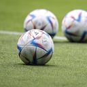 This picture shows the official FIFA World Cup Qatar 2022 footballs called "Al Rihla" during Japan's training session at the Panasonic stadium in Suita, Osaka prefecture on June 13, 2022, ahead of their Kirin Cup final match against Tunisia on June 14. (Photo by Charly TRIBALLEAU / AFP)