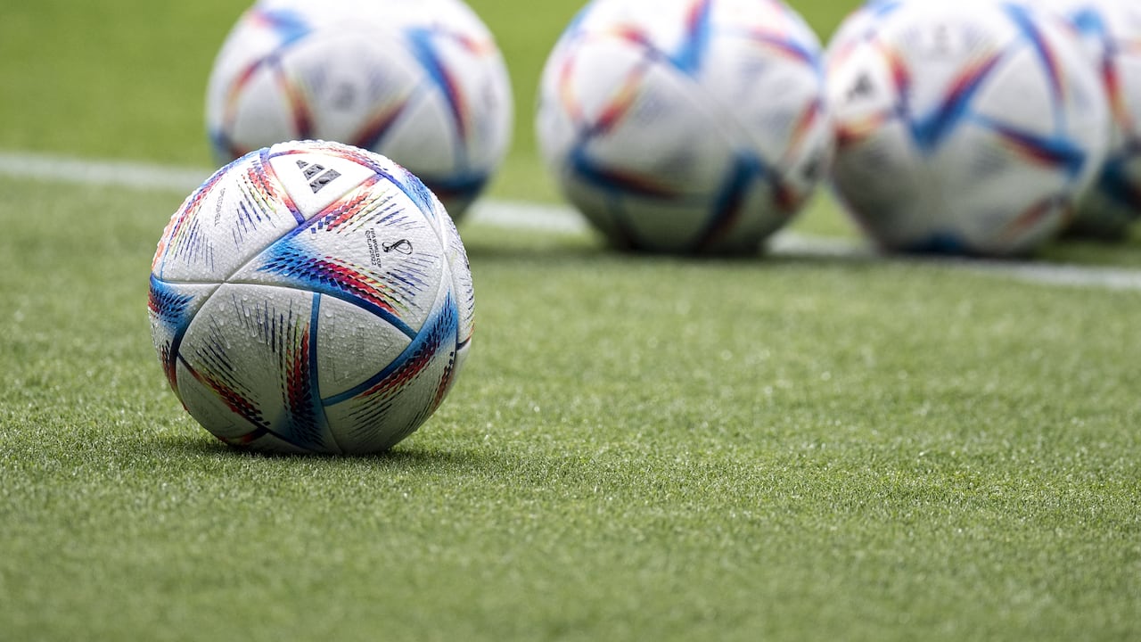 This picture shows the official FIFA World Cup Qatar 2022 footballs called "Al Rihla" during Japan's training session at the Panasonic stadium in Suita, Osaka prefecture on June 13, 2022, ahead of their Kirin Cup final match against Tunisia on June 14. (Photo by Charly TRIBALLEAU / AFP)