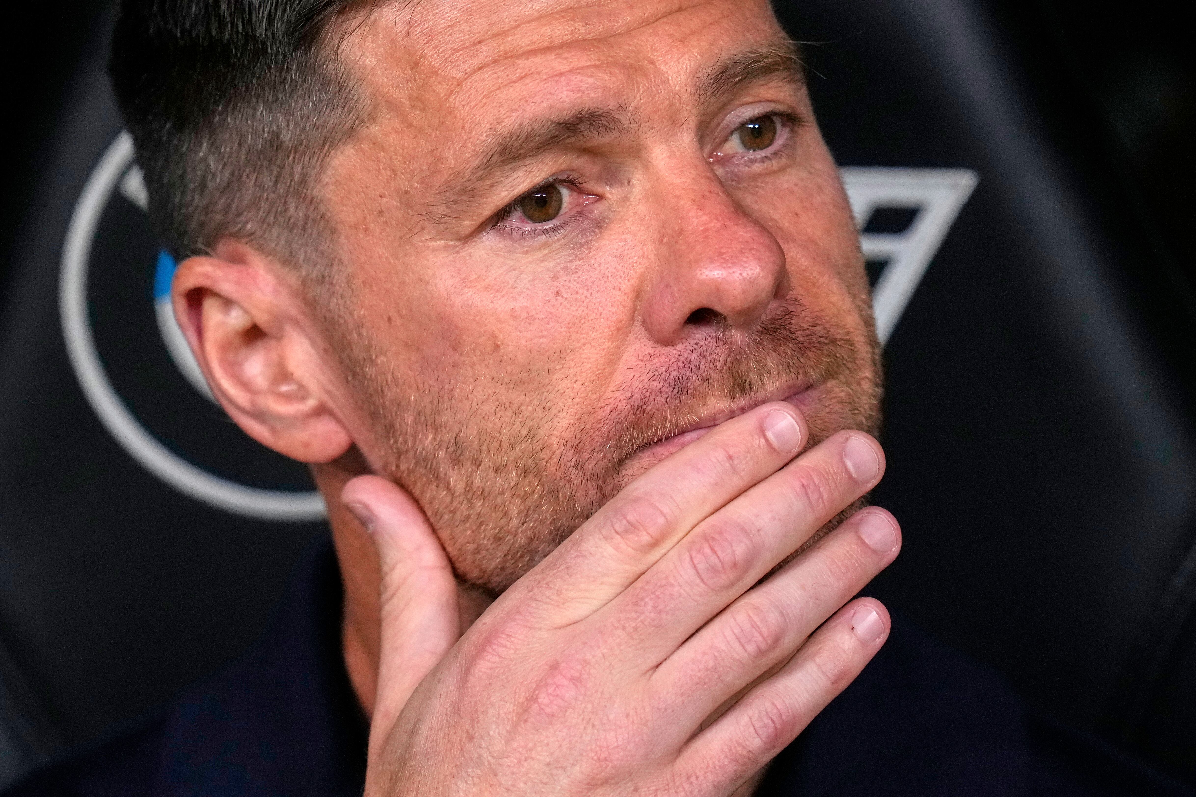 Real Madrid's head coach Xabi Alonso takes his seat on the bench for the Spanish La Liga soccer match between Real Madrid and Mallorca in Madrid, Saturday, Aug. 30, 2025. (AP Photo/Manu Fernandez)