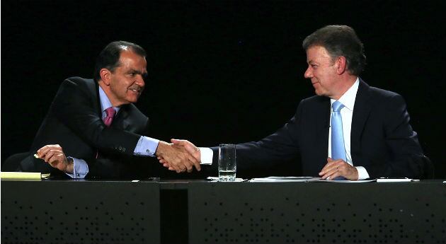 Óscar Iván Zuluaga y Juan Manuel Santos.