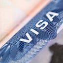 Close up of american visa label in passport. SHallow depth of field.