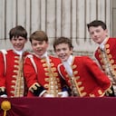 LONDON, ENGLAND - MAY 06: (L-R) Page of Honour Lord Oliver Cholmondeley, Prince George of Wales, Page of Honour Nicholas Barclay and Page of Honour Ralph Tollemache seen on the Buckingham Palace balcony during the Coronation of King Charles III and Queen Camilla on May 06, 2023 in London, England. The Coronation of Charles III and his wife, Camilla, as King and Queen of the United Kingdom of Great Britain and Northern Ireland, and the other Commonwealth realms takes place at Westminster Abbey today. Charles acceded to the throne on 8 September 2022, upon the death of his mother, Elizabeth II. (Photo by Christopher Furlong/Getty Images)