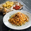 Homemade fettucine pasta with bolognese sause