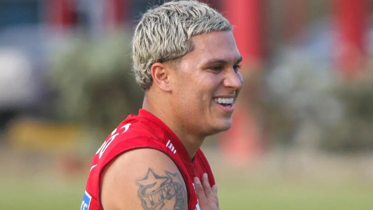Juan Fernando Quintero sonriendo en una entrenamiento de Junior