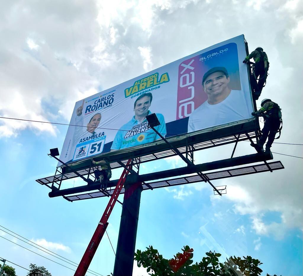 Álex Char y Alfredo Varela, en una valla en Barranquilla