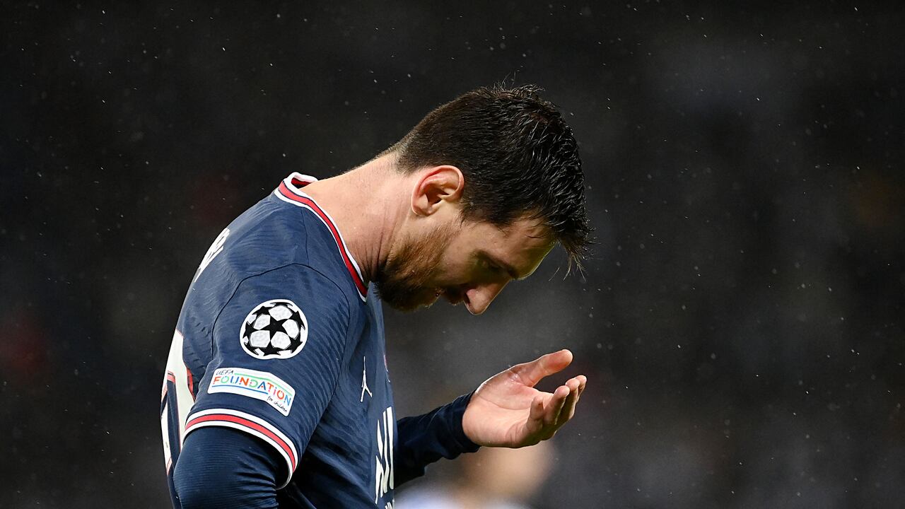Paris Saint-Germain's Argentinian forward Lionel Messi reacts during the UEFA Champions League round of 16 first leg football match between Paris Saint-Germain (PSG) and Real Madrid at the Parc des Princes stadium in Paris on February 15, 2022. (Photo by FRANCK FIFE / AFP)