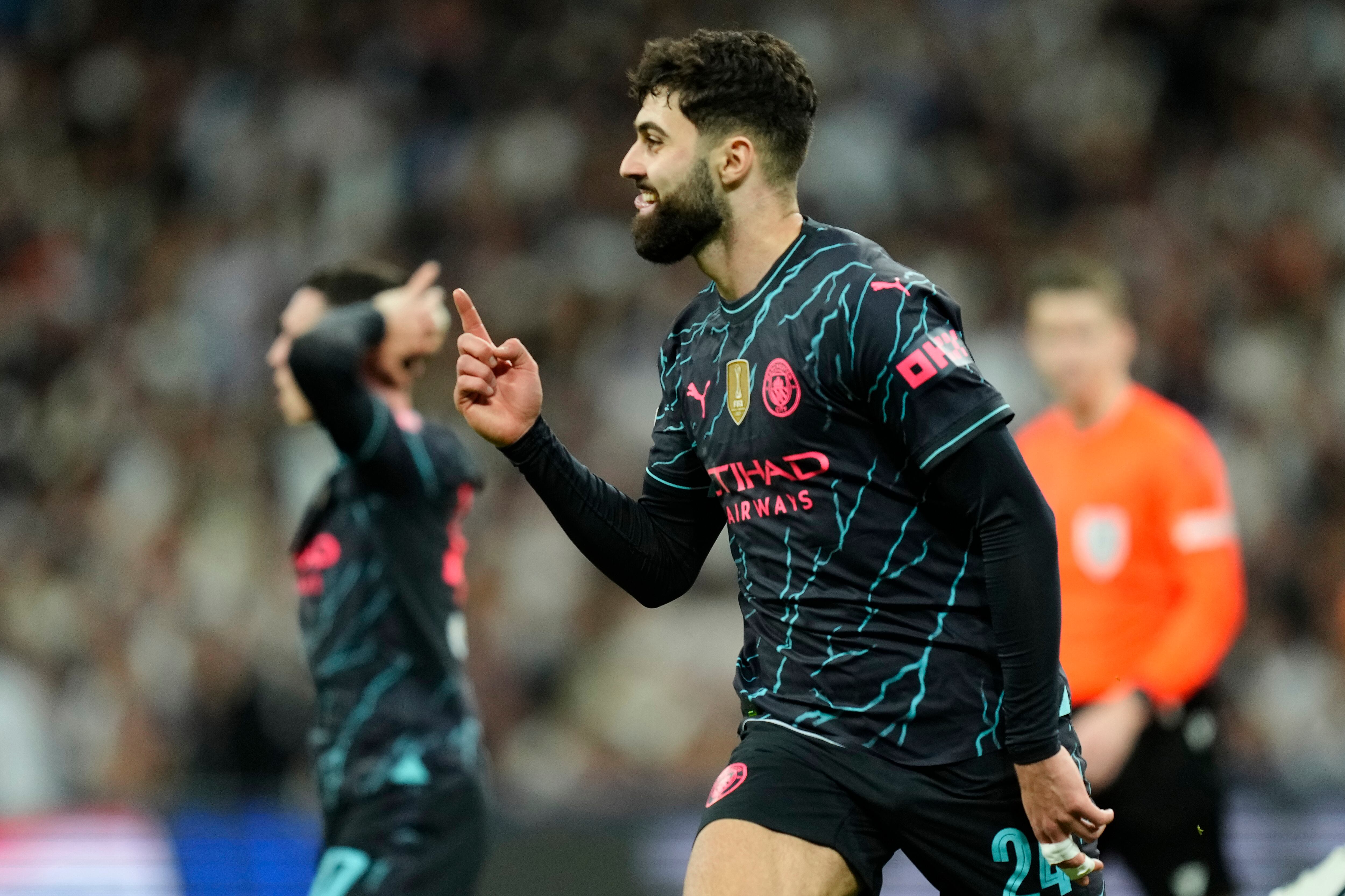 Manchester City's Josko Gvardiol celebrates after scoring his side's third goal during the Champions League